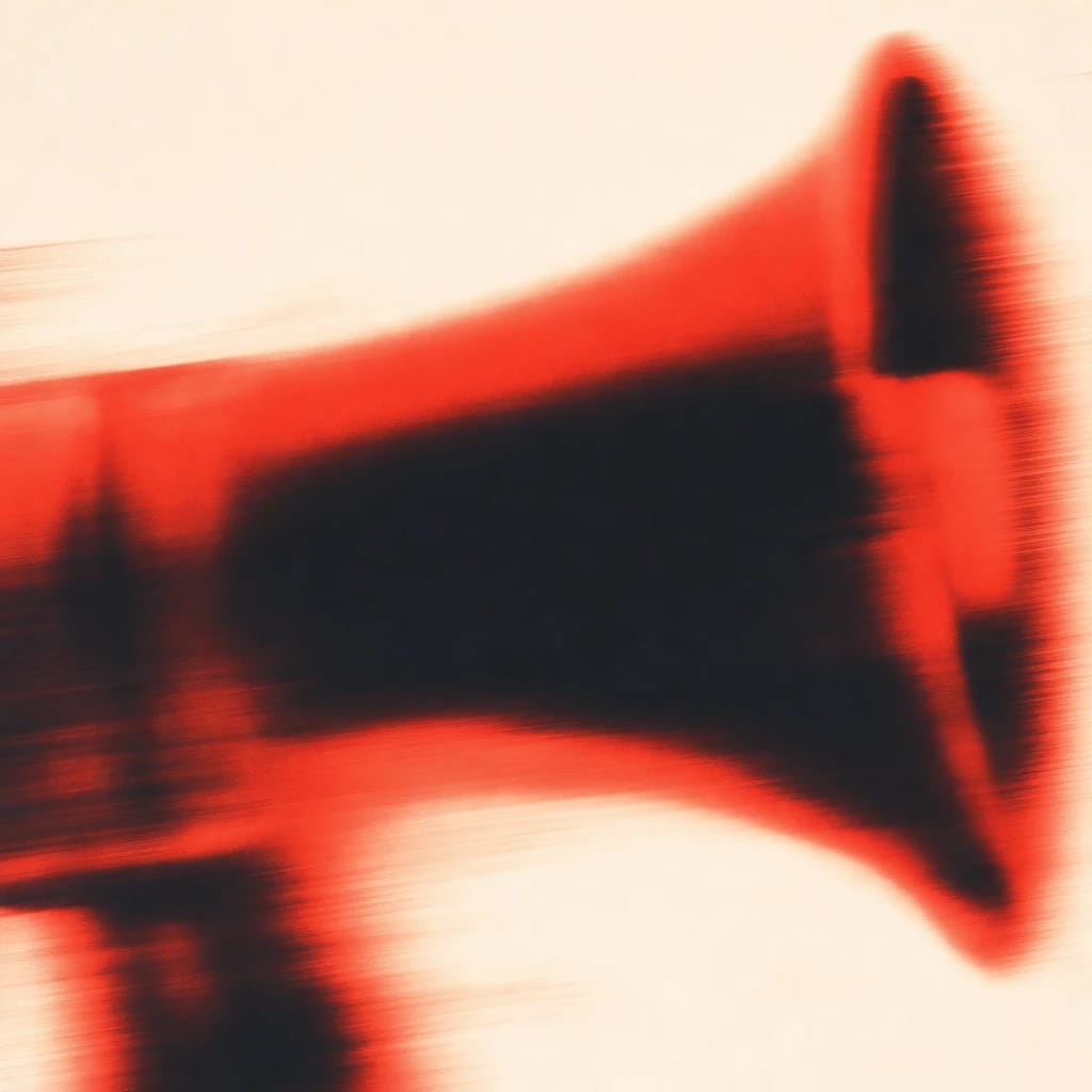 Stylized scene featuring a large, red megaphone dominating the frame, rendered in orange, off-white