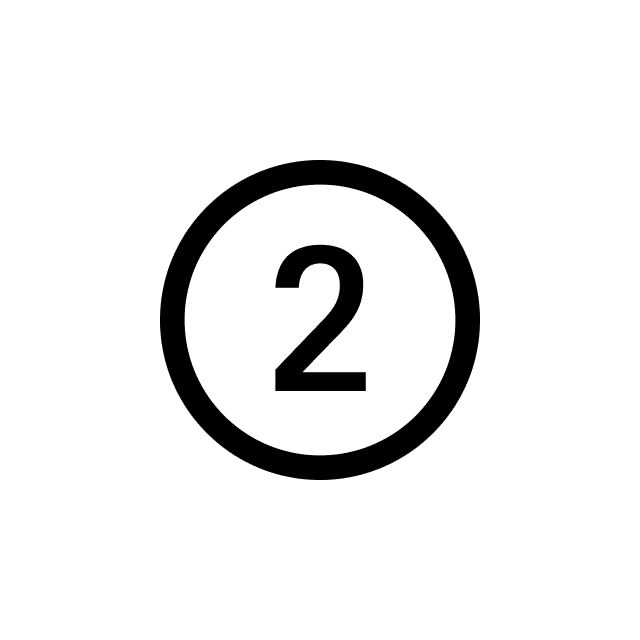 A black silhouette of a person sitting at a desk with a computer, surrounded by books and papers.